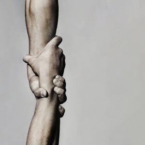 stock-photo-helping-hand-concept-and-international-day-of-peace-support-helping-hand-outstretched-isolated-1203468499-transformed